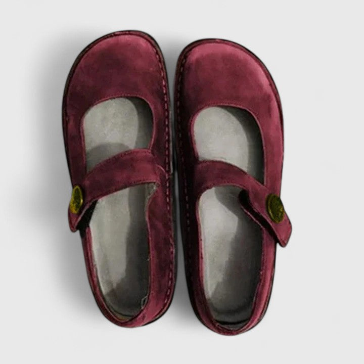 Green orthopedic women's Mary Jane shoes with adjustable strap, cushioned for therapeutic comfort.