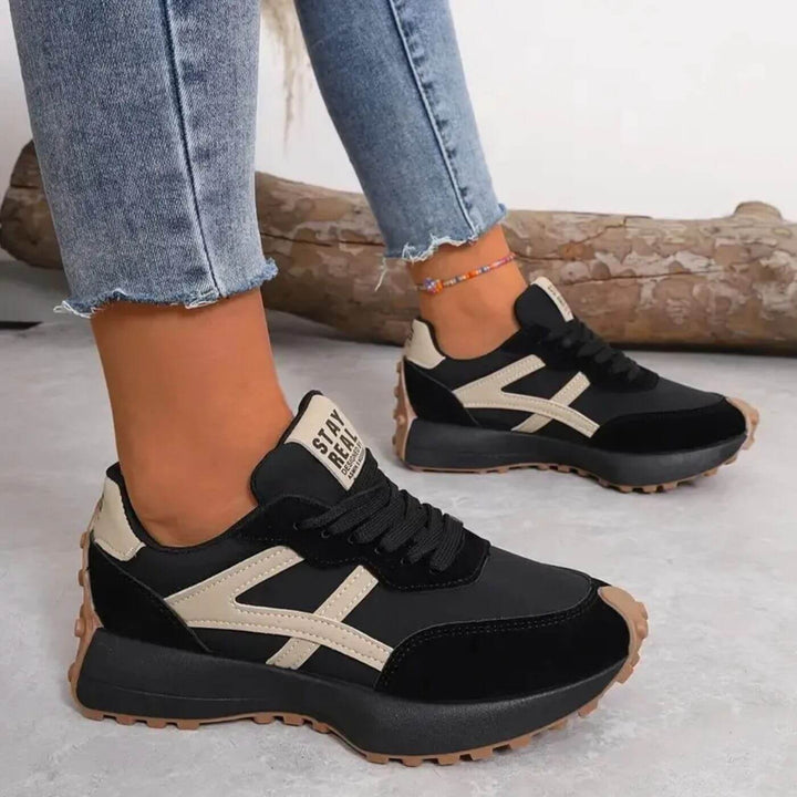 Women's orthopedic panel design sneakers, offering supportive comfort for all-day wear and walking.