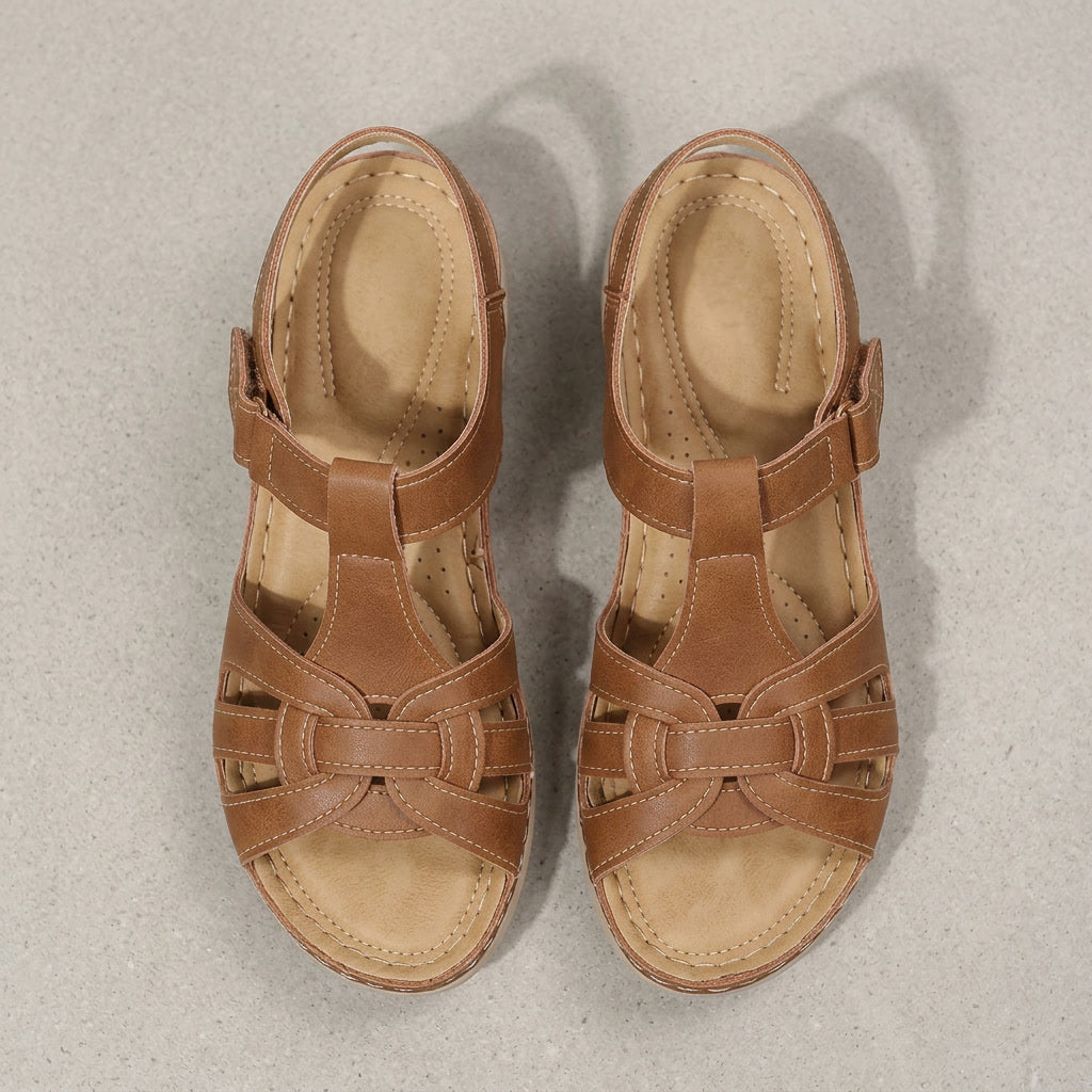 Black orthopedic open-toe sandals for women, offering daily comfort & support.
