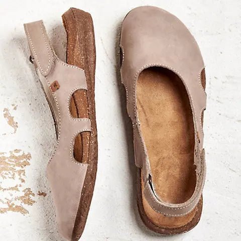 Supportive women's orthopedic sandals with arch support, flat sole, and adjustable straps for daily comfort.