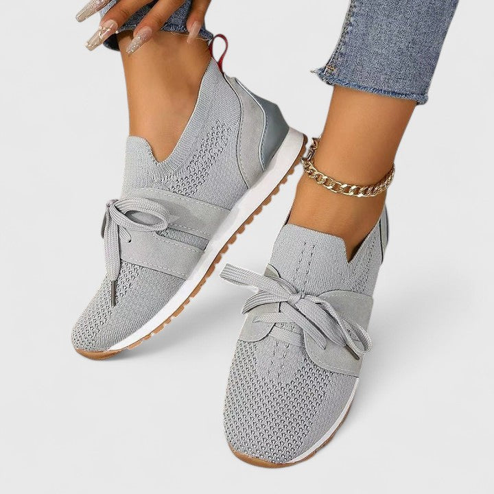Comfortable women's slip-on walking shoes, orthopedic design with breathable upper & non-slip sole.
