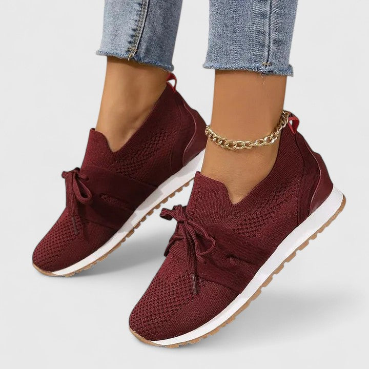 Stylish women's casual slip-on sneakers in various colors, offering orthopedic arch support for walking.