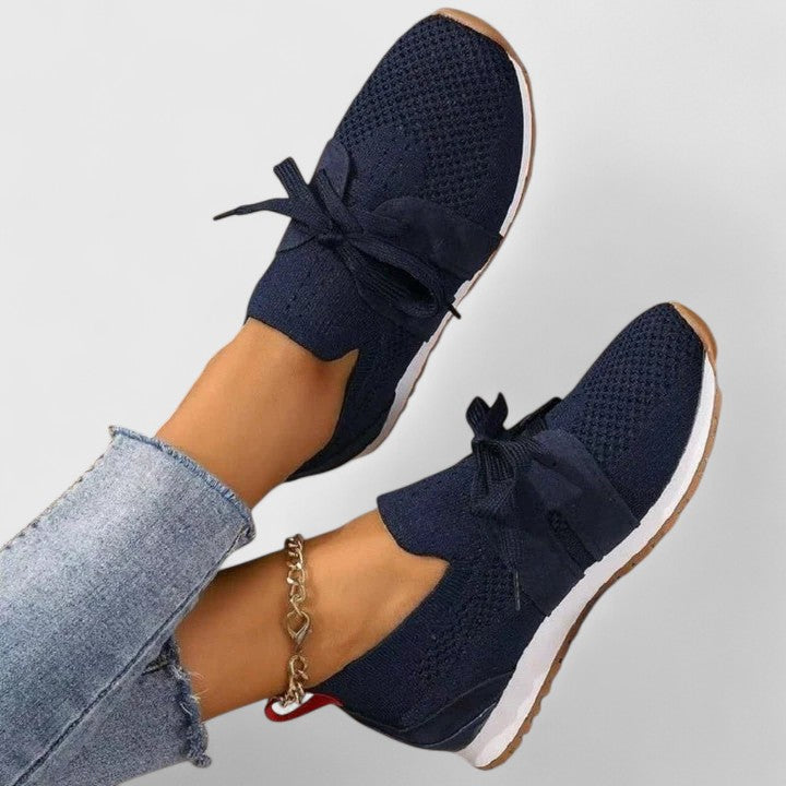Easy slip-on orthopedic sneakers for women, providing superior arch support & comfort for active walking.