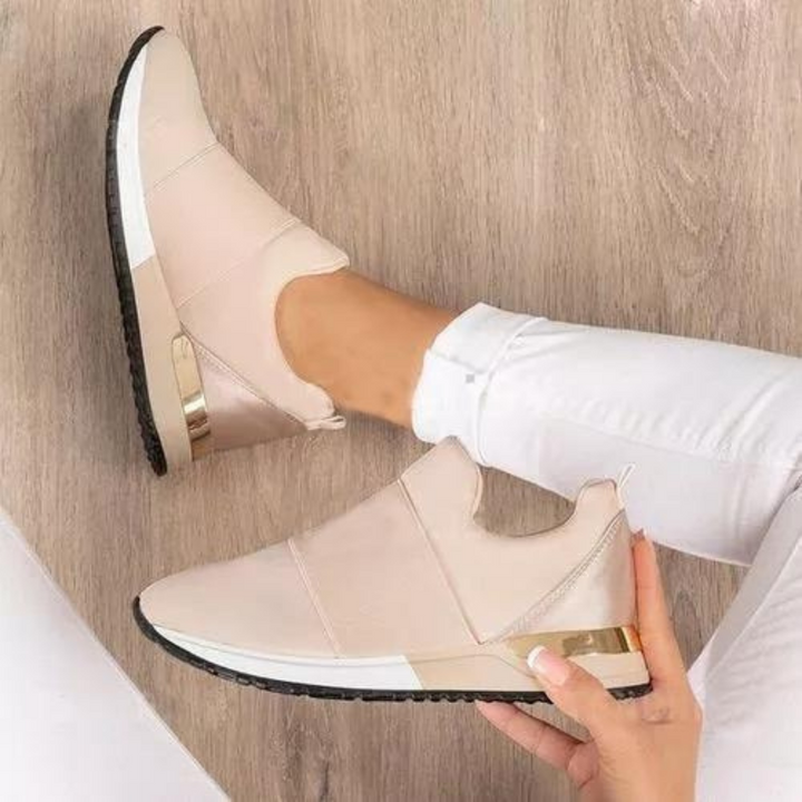 Stylish & supportive women's orthopedic sneakers, offering pain relief, posture support & comfort.