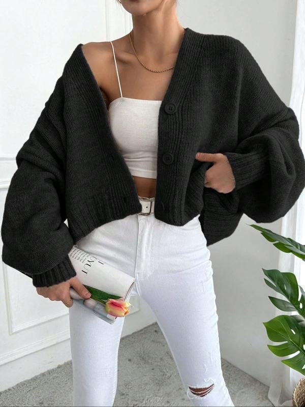 Soft wool blend oversized chunky knit cardigan, offering a relaxed fit for women's fashion.