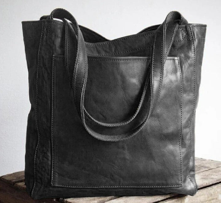 Stylish women's large capacity leather shoulder bag, ideal as an everyday fashion accessory.