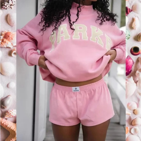 Women's oversized graphic crew neck sweater, perfect for casual, trendy fall & winter style.