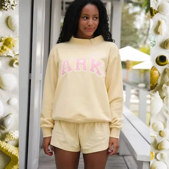 Trendy women's oversized graphic sweater, a chic loose fit pullover for fall & winter fashion.