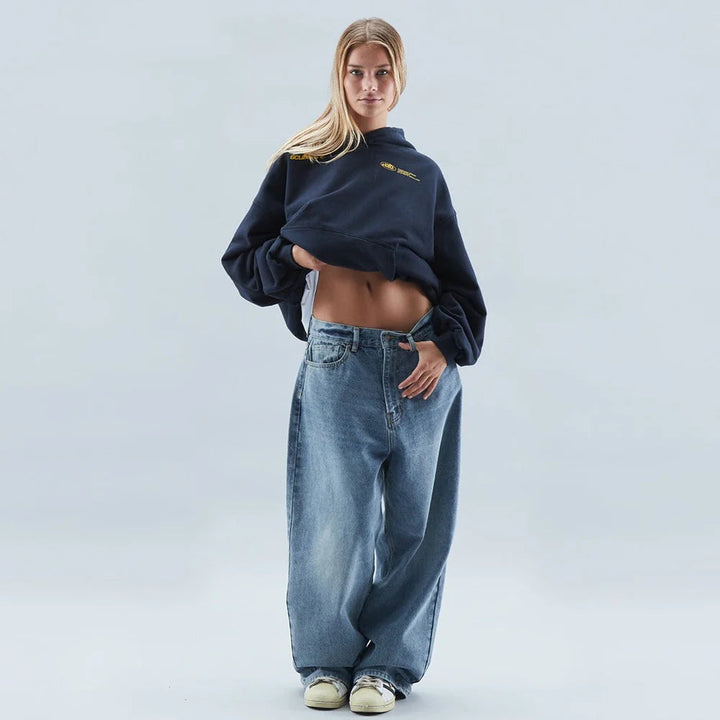 Comfortable women's oversized graphic pullover hoodie, ideal for casual wear and relaxed fashion.