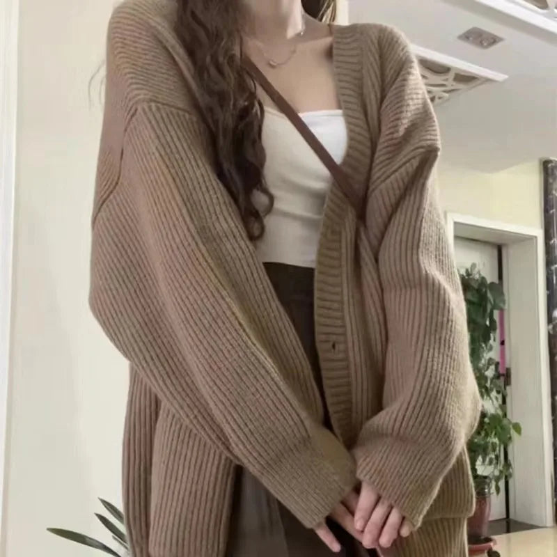 Women's oversized knit button-front cardigan, cozy sweater in relaxed fit, ideal for fall fashion