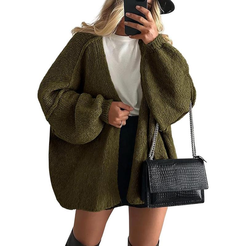 Women's oversized knit cardigan in a soft cashmere-feel acrylic blend, perfect for winter fashion.
