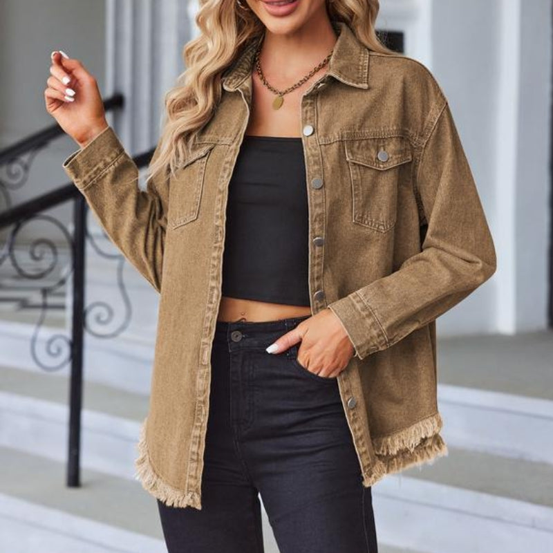 Fashionable multi-color women's oversized denim jacket featuring a stylish raw hem detail.