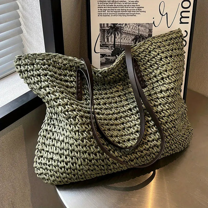 Women's oversized straw beach tote bag, perfect for summer fashion & travel.