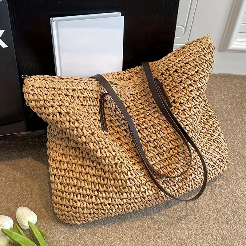 Casual women's woven straw tote bag, spacious for beach trips, summer travel, or daily use.