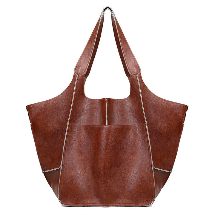 Women's everyday oversized vintage leather shoulder bag, combining utility with vintage style.