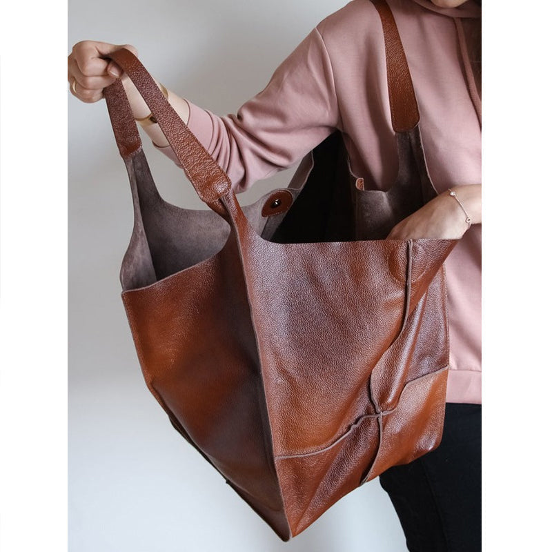 Elegant women's oversized vintage leather shoulder bag, a practical and stylish fashion accessory.