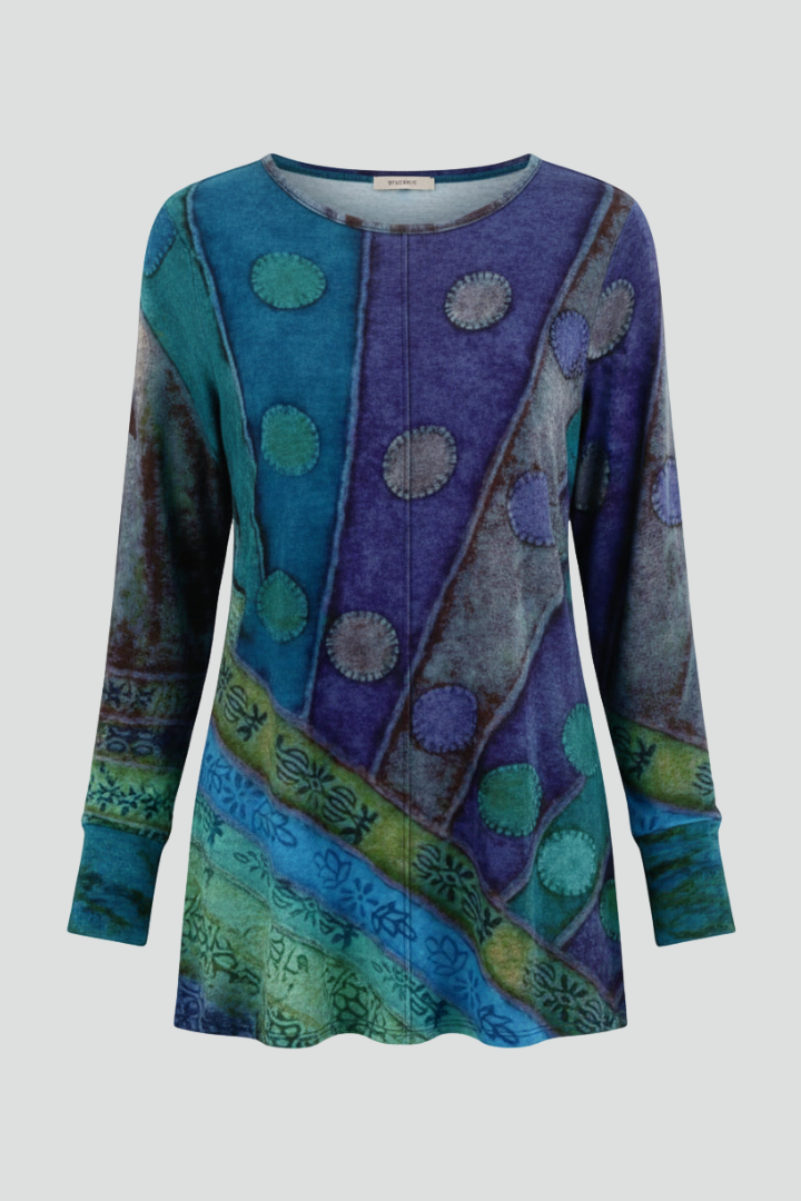Women's patchwork tunic top with ribbed cuffs, relaxed fit for comfortable casual wear.