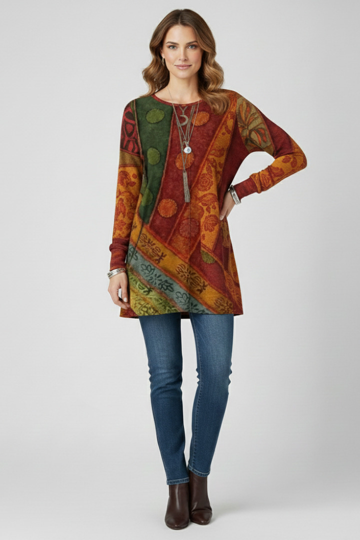 Unique patchwork design on a women's long sleeve tunic, comfortable relaxed fit, stylish for casual wear.