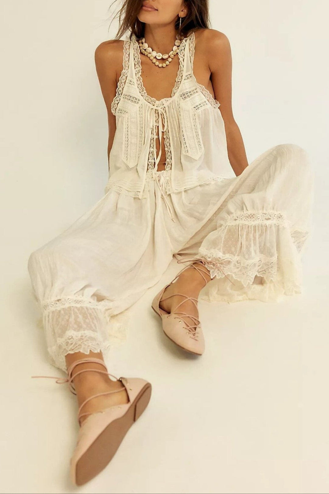 Side profile of a woman in the peach cotton two-piece set with lace, showcasing fit.