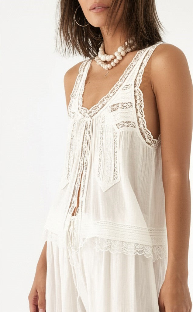 Peach cotton two-piece set for women, with wide-leg pants and a beautiful lace-trimmed top.