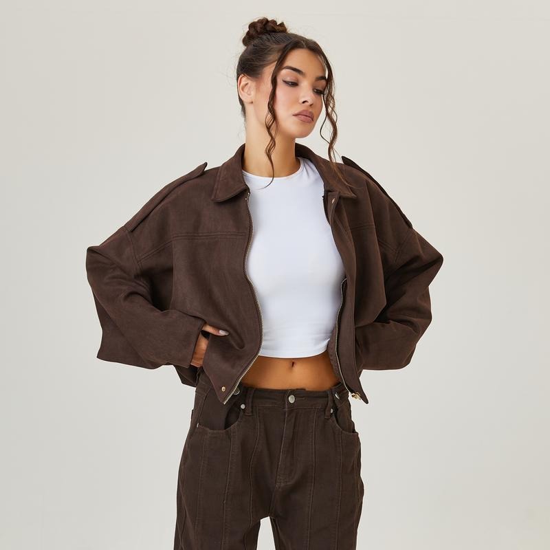 Women's pink suede cropped bomber jacket with ribbed trim, front zipper, and vintage style