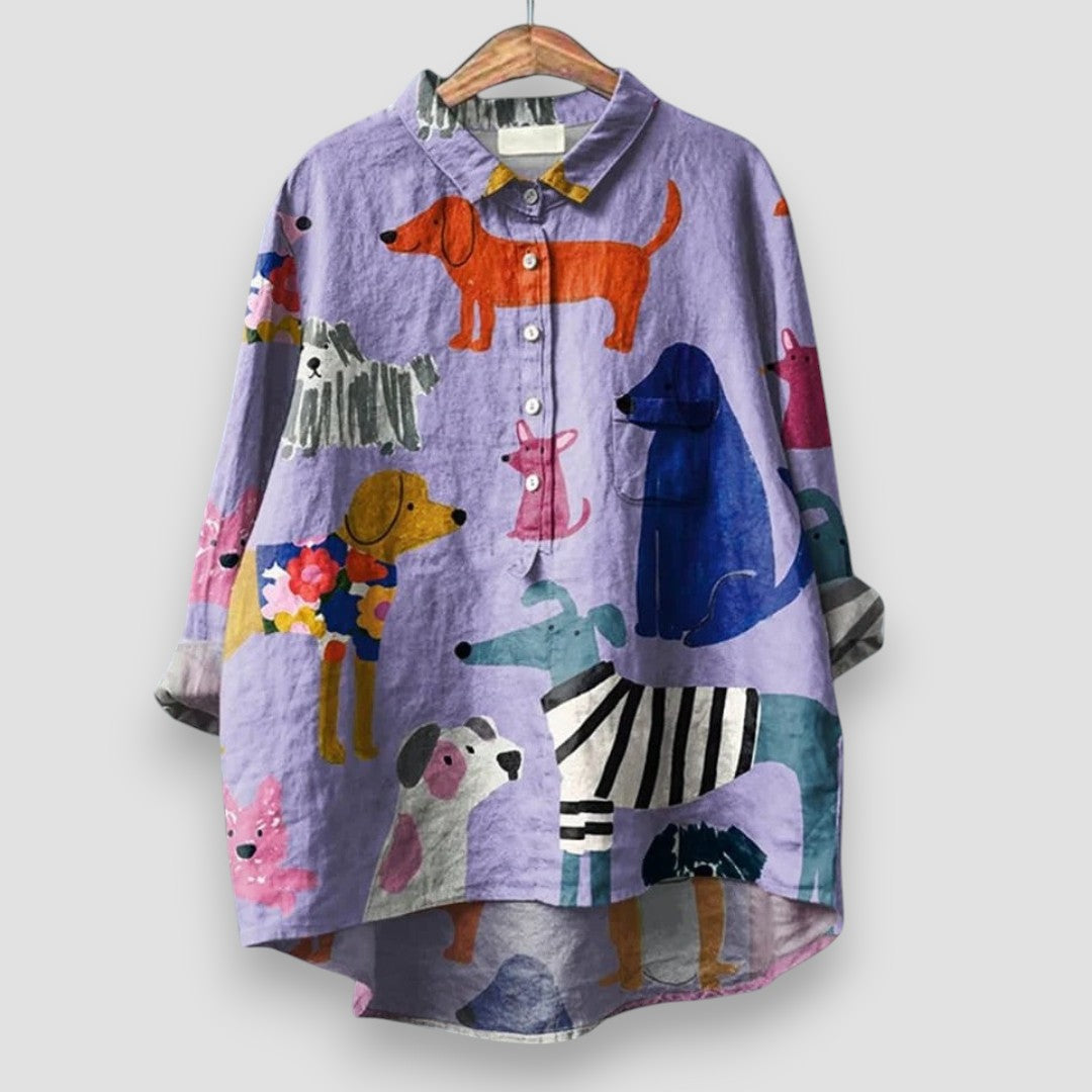 Women's playful dog print casual short sleeve shirt. Comfortable summer top with cute animal design, perfect for everyday wear.