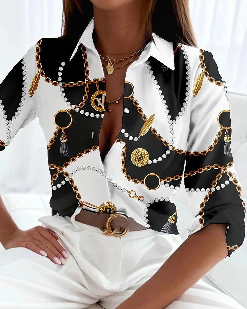 Stylish women's plus size blouse with an abstract geometric print. Versatile long sleeve button-up for casual or smart-casual wear.