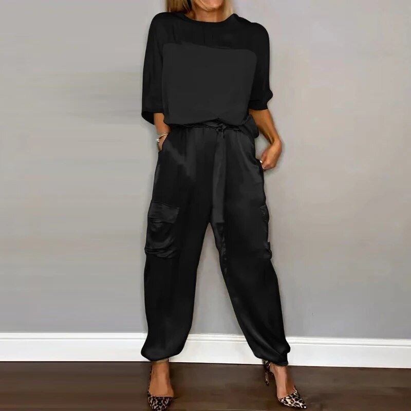 Comfy women's plus size two-piece loungewear set. Drawstring cargo pants & top for relaxing or casual wear.