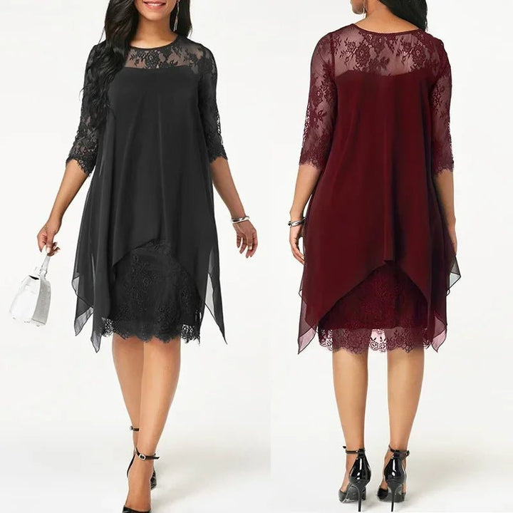 Plus size lace cocktail dress with quarter sleeves, flattering for wedding guests & evening parties.