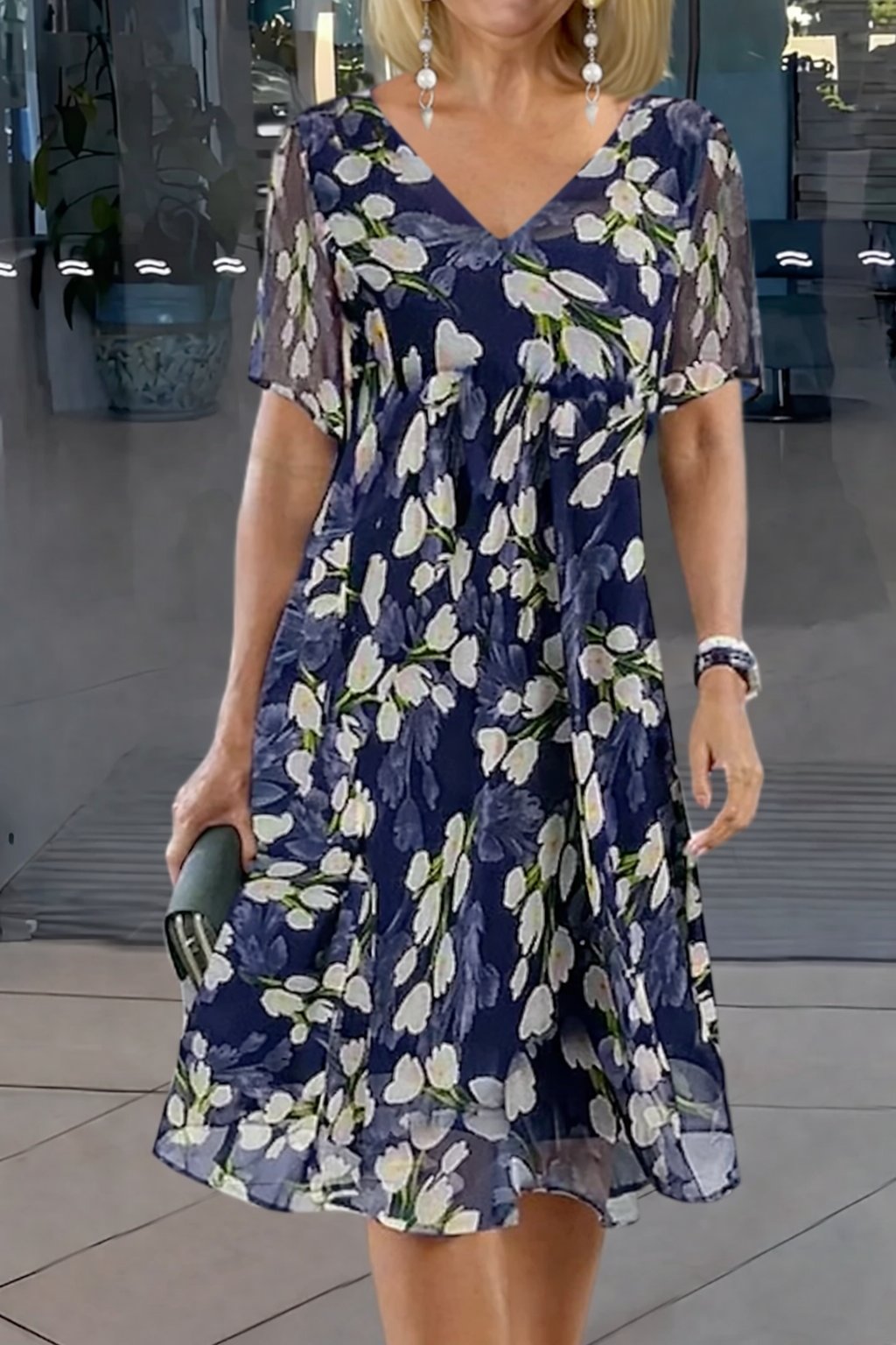 Women's plus size floral midi dress, V-neck A-line style, perfect for elegant summer occasions.