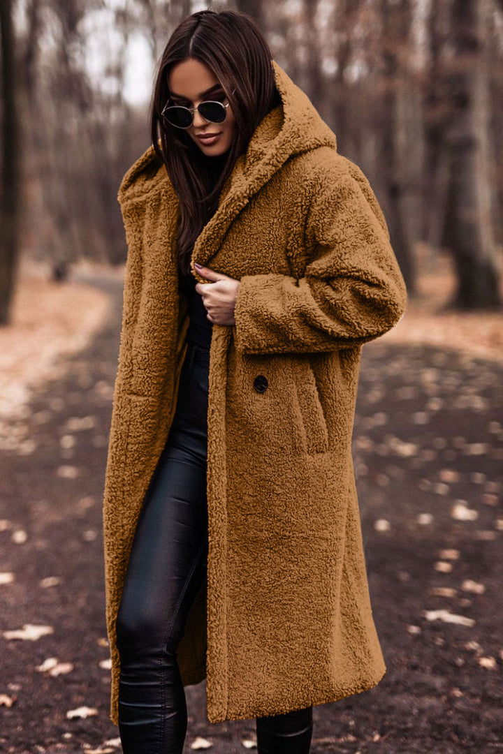 Elegant women's faux shearling mid-calf coat, perfect for cold weather