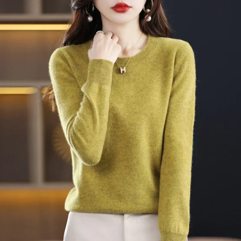 Cozy long sleeve women's crewneck pullover, relaxed fit for everyday elegance.