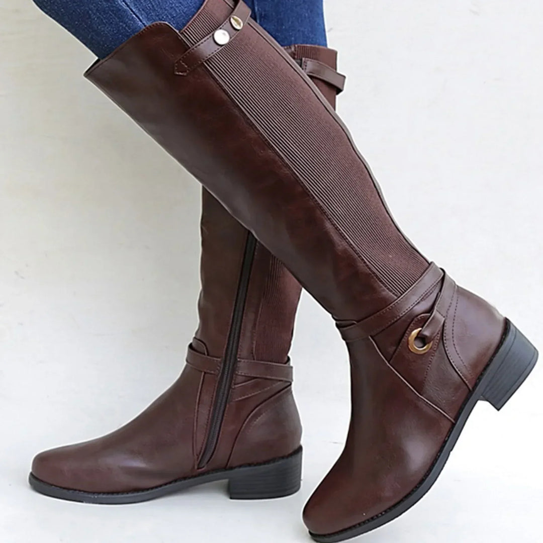 Stylish women's black leather orthopedic boots, featuring durable design and cushioned support for casual wear.