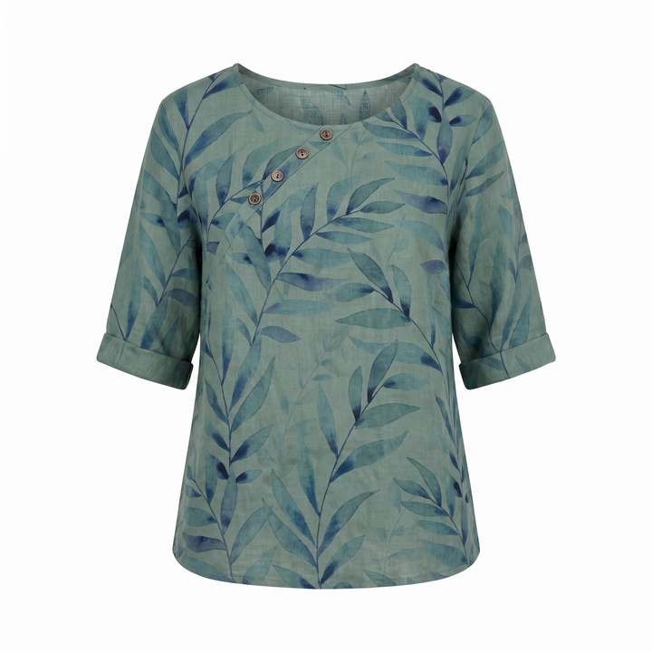 Green women's printed blouse with elegant leaf pattern & chic asymmetric button closure.