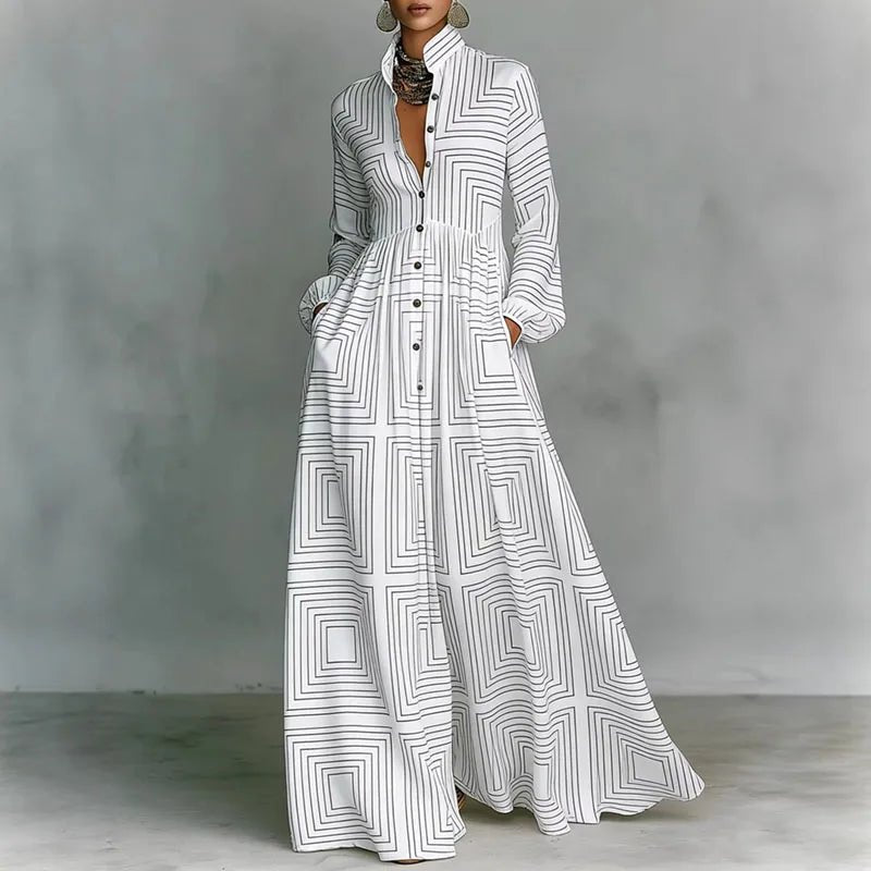 Women's printed bohemian maxi dress with long sleeves, stand collar, & flowy skirt. Perfect for spring/summer.