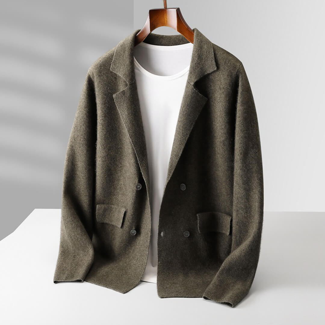 Woman's hand touching the soft knitwear of the cashmere button-front cardigan sweater, comfort focus