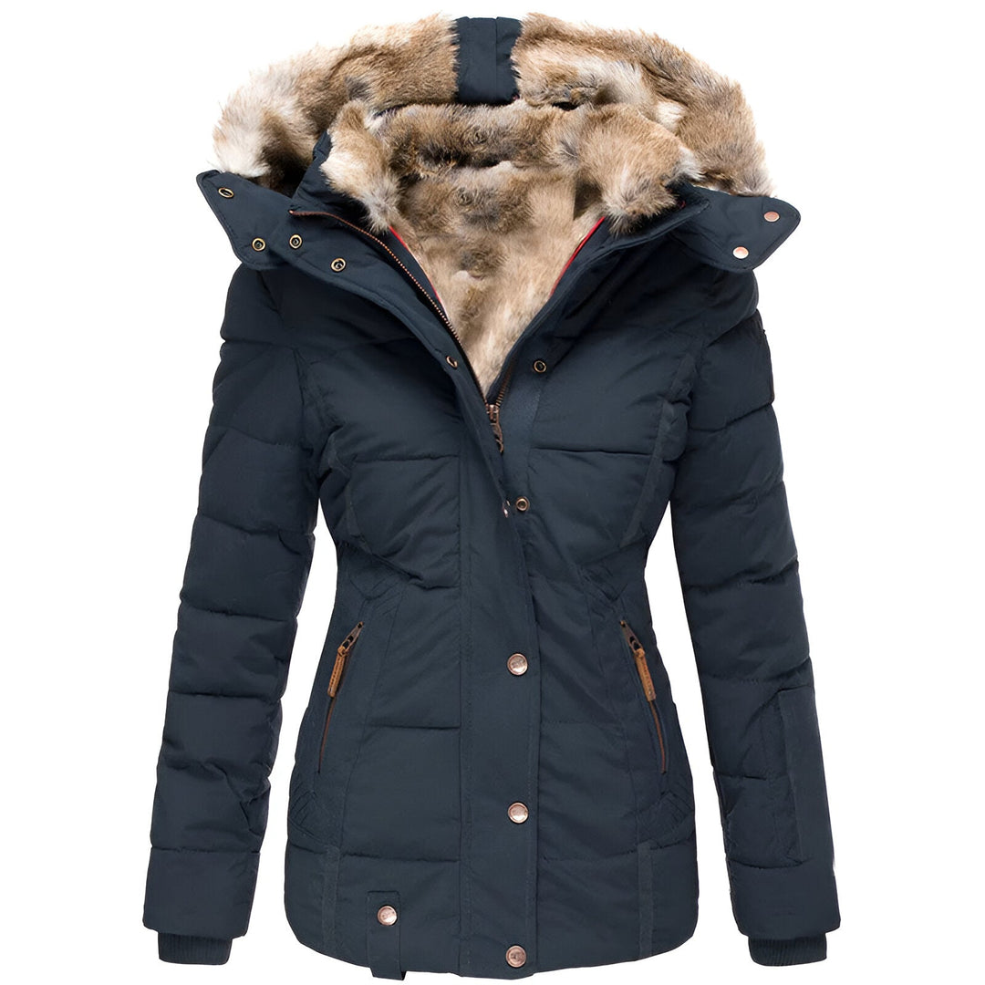 Detail of the faux fur trim on the hood of a women's stylish quilted puffer winter coat.