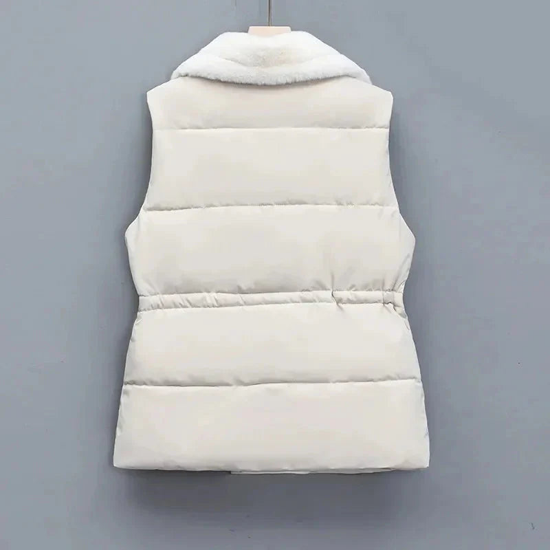 Vibrant colored women's insulated puffer vest, a trendy addition to any winter outfit