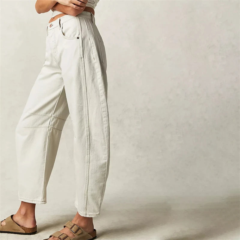Outfit inspiration: women's barrel leg denim jeans paired with a casual top, showcasing relaxed style