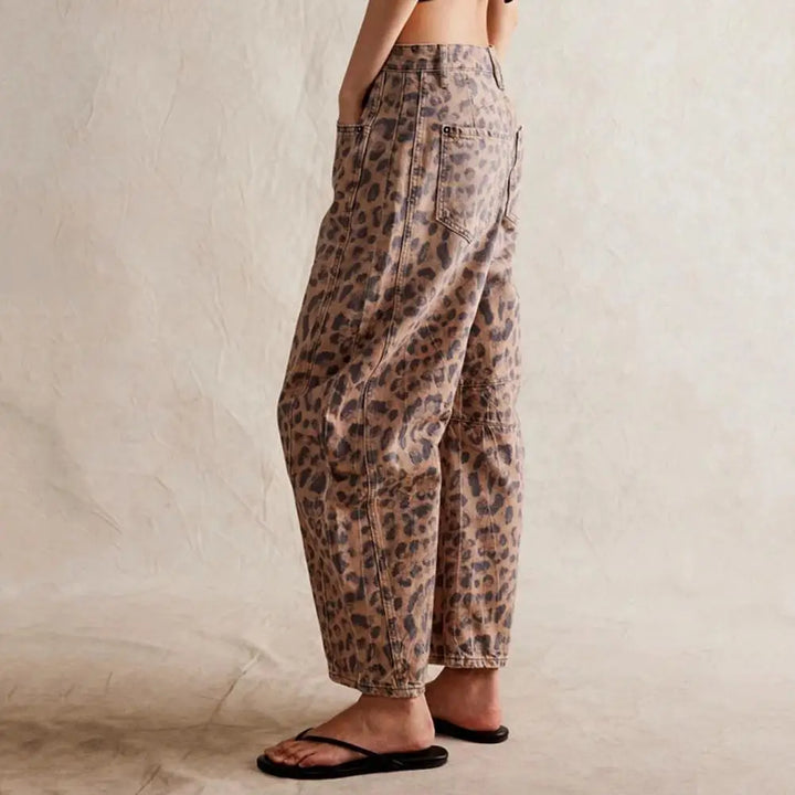 Display of women's relaxed fit barrel leg denim jeans, emphasizing the roomy yet stylish design
