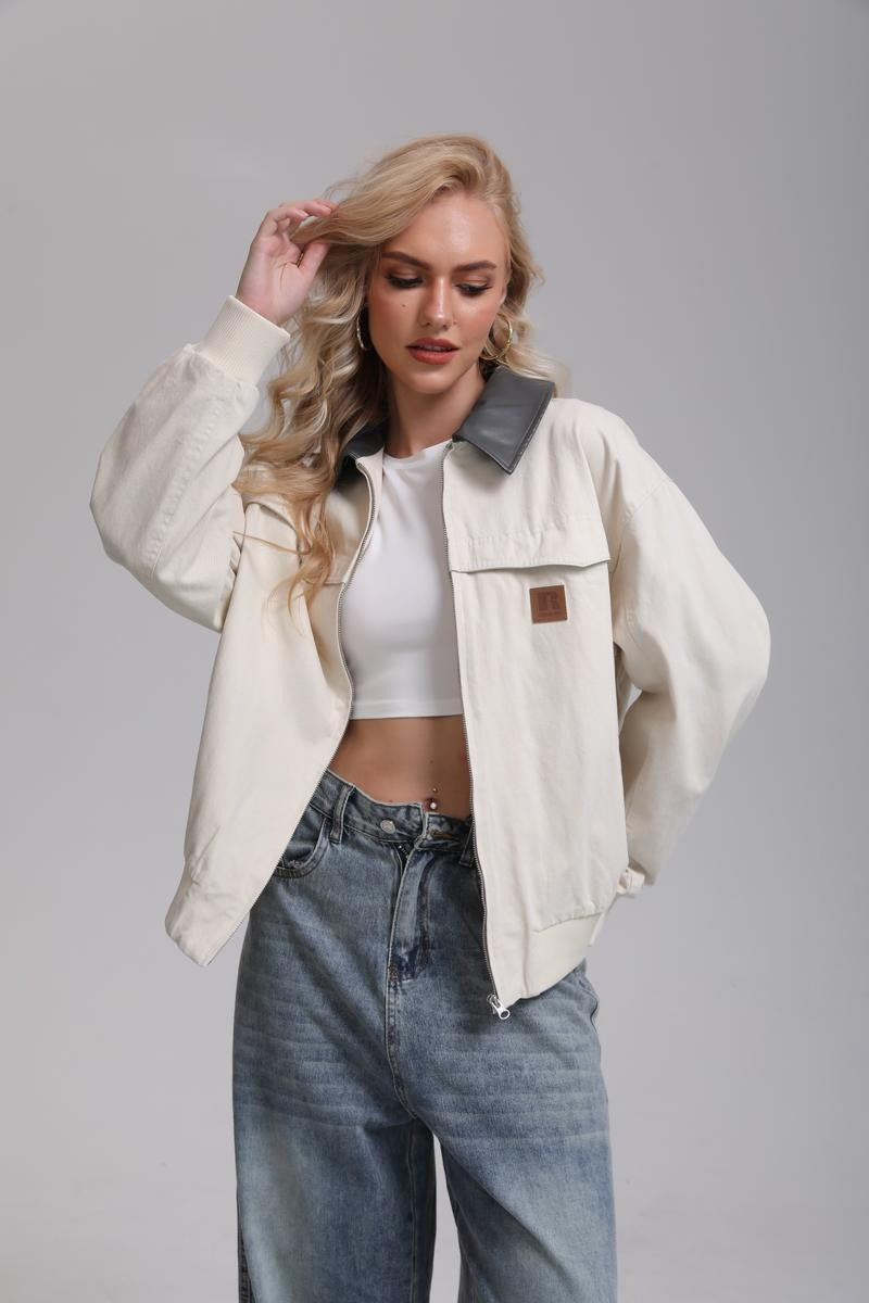 Stylish women's zip-up canvas jacket, ideal casual outerwear, featuring a comfy relaxed fit and contrast collar.
