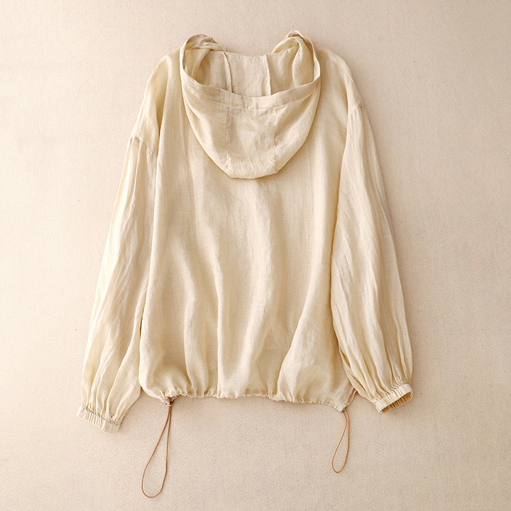 Stylish women's button-front relaxed fit hoodie, comfortable & airy for warm weather.