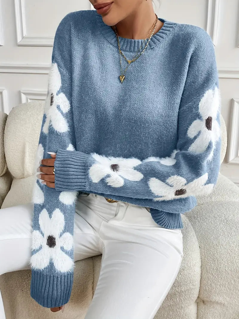 Cozy women's long sleeve pullover sweater featuring a charming daisy pattern, ideal for winter.