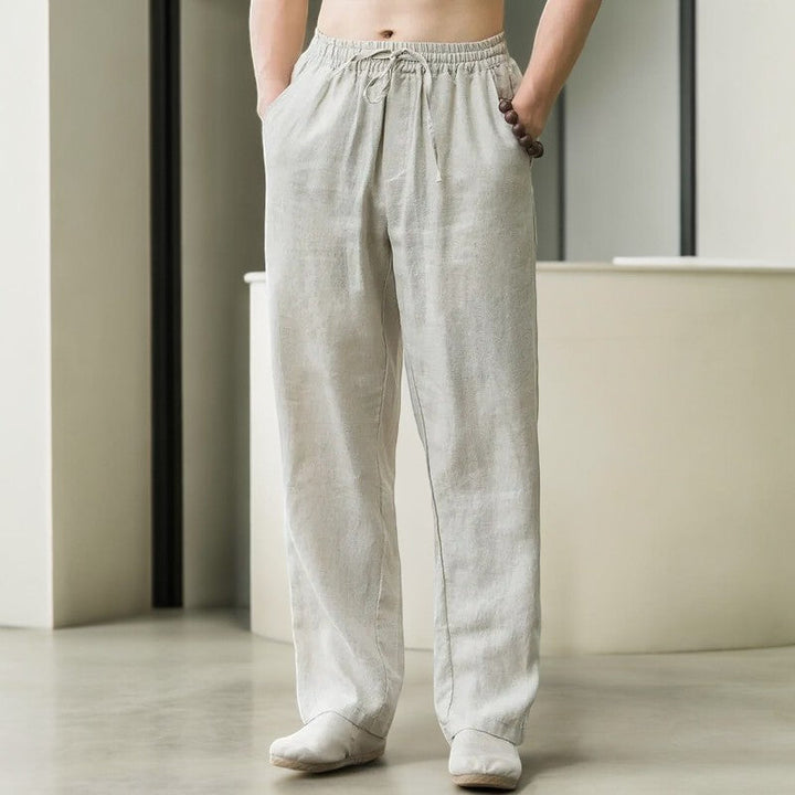 Women's relaxed fit linen pants in natural beige, perfect for comfortable summer wear