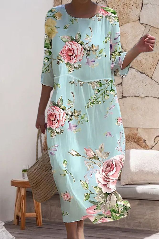 Elegant women's printed midi dress, relaxed and versatile for everyday wear, spring, or summer occasions.