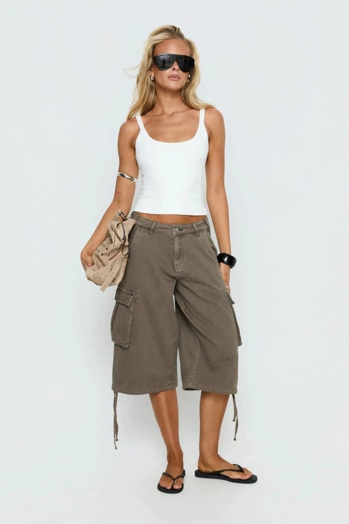 Front view of women's relaxed mocha cargo capris, showing drawstring waist & utility pockets, casual summer style.