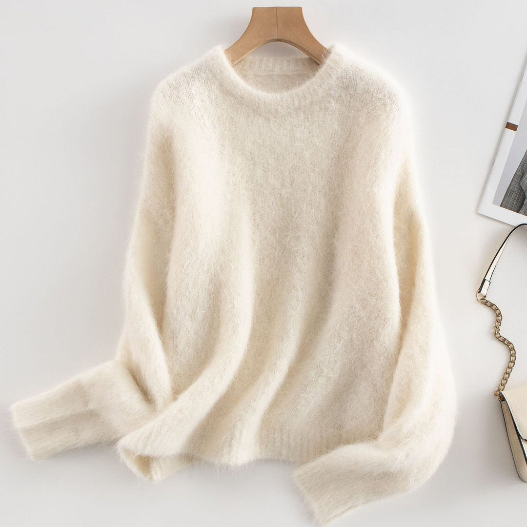 Soft wool blend women's ribbed sweater with a classic crew neck for winter wear.