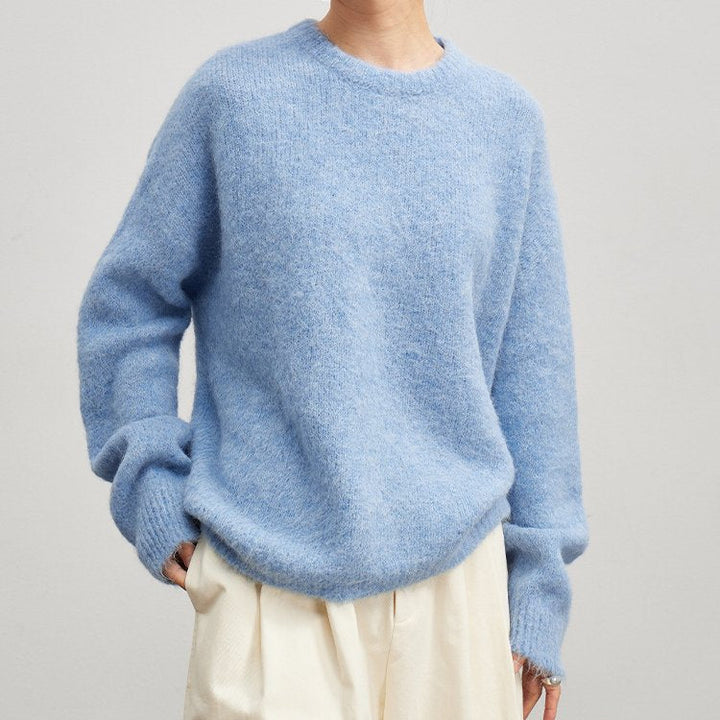 Stylish women's ribbed knit sweater with a relaxed fit, ideal for layering this fall.
