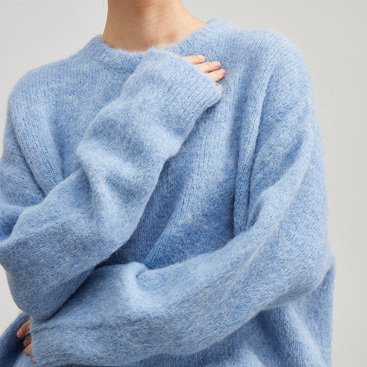 Detail shot of the quality craftsmanship of a women's relaxed fit wool blend sweater.