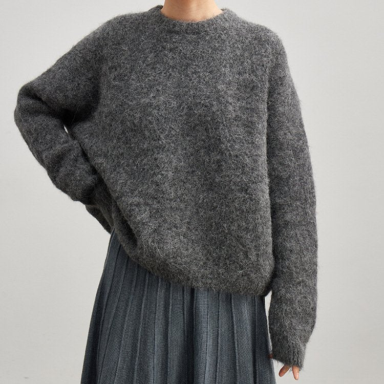 Warm and cozy women's ribbed sweater, a must-have for any fall or winter wardrobe.